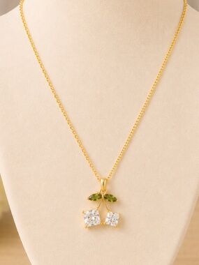 Gold necklace with cherries